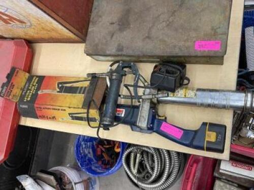(2) AUTO GREASE GUNS (1 BATTERY POWRED WITH BATTERY AND CHARGER)