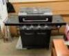 NEVER USED PREMIER 4-BURNER PROPANE GAS GRILL IN BLACK WITH SIDE BURNER