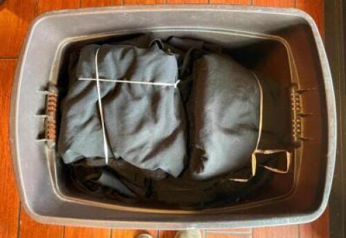 BIN OF KITCHEN APRONS WITH LID