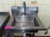 WALL MOUNTED STAINLESS HAND SINK.