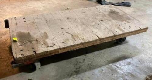 DESCRIPTION: FLATBED WOODEN CART SIZE: 26"X53" LOCATION: WAREHOUSE LOCATION: 6249 LORENS LN. CEDAR HILL, MO 63016 QTY: 1