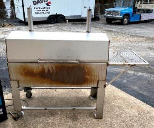 DESCRIPTION: 4' CHARCOAL GRILL WITH SIDE TABLE INFORMATION: HAS WHEELS LOCATION: FRONT ENTRANCE LOCATION: 6249 LORENS LN. CEDAR HILL, MO 63016 QTY: 1