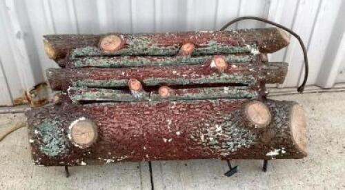 DESCRIPTION: ODORLESS GAS LOG FIREPLACE PIECE BRAND/MODEL: GLO-FIRE 4A INFORMATION: 42,000 BTU LOCATION: FRONT ENTRANCE LOCATION: 6249 LORENS LN. CEDA