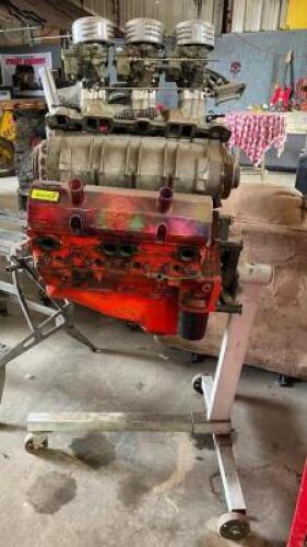 ROLLING ENGINE MOUNT WITH DISPLAY UNIT