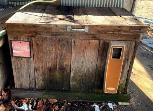 DESCRIPTION: VINTAGE COCA-COLA COOLER WITH FARM WOOD EXTERIOR INFORMATION: NOT IN WORKING CONDITION SIZE: 38"X22"X35" LOCATION: HOUSE #2 LOCATION: 652
