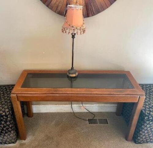 DESCRIPTION: WOODEN SIDE TABLE WITH GLASS TOP AND LAMP SIZE: 48"X17"X26" LOCATION: HOUSE #2 LOCATION: 6521 WOODLAND DRIVE CEDAR HILL, MO 63016 QTY: 1