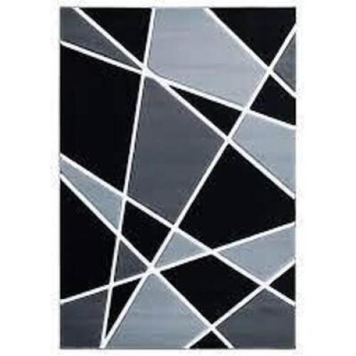 DESCRIPTION: (1) INDOOR AREA RUG BRAND/MODEL: UNITED WEAVERS INFORMATION: GREY RETAIL$: $87.41 EA SIZE: 3X4 QTY: 1