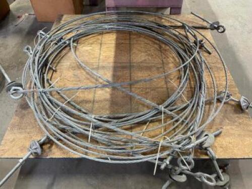 DESCRIPTION: LARGE GROUP OF GALVANIZED STEEL CABLE LOCATION: WOOD TABLE / TIRE RACK AREA THIS LOT IS: ONE MONEY QTY: 1
