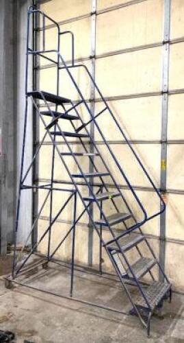DESCRIPTION: 10 FT. PORTABLE STAIRWELL LOCATION: WOOD TABLE / TIRE RACK AREA THIS LOT IS: ONE MONEY QTY: 1