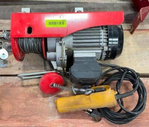 DESCRIPTION: CEILING MOUNTED HOIST WITH CONTROLLER AND BRACKET LOCATION: WOOD TABLE / TIRE RACK AREA THIS LOT IS: ONE MONEY QTY: 1