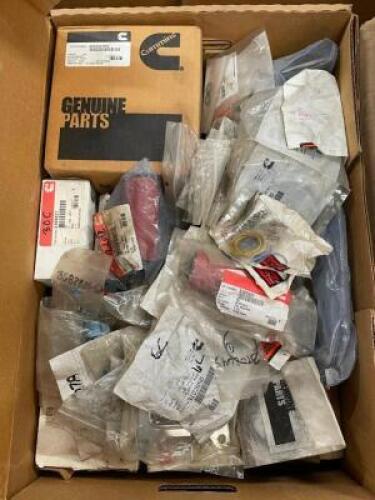 DESCRIPTION: ASSORTED CUMMINS TRUCK PARTS INFORMATION: SEE PHOTOS FOR MORE DETAIL ON SPECIFIC PARTS LOCATION: WOOD TABLE / TIRE RACK AREA THIS LOT IS: