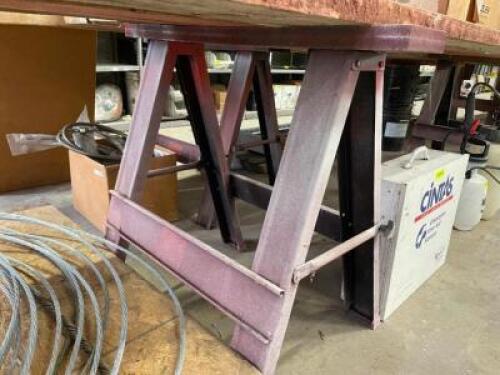 DESCRIPTION: (2) - 30" FOLDING SAWHORSES ADDITIONAL INFORMATION: FRAMES ONLY. WOOD NOT INCLUDED. LOCATION: WOOD TABLE / TIRE RACK AREA THIS LOT IS: SO
