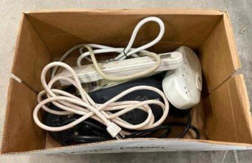 DESCRIPTION: LARGE BOX OF SURGE PROTECTORS LOCATION: WOOD TABLE / TIRE RACK AREA THIS LOT IS: ONE MONEY QTY: 1