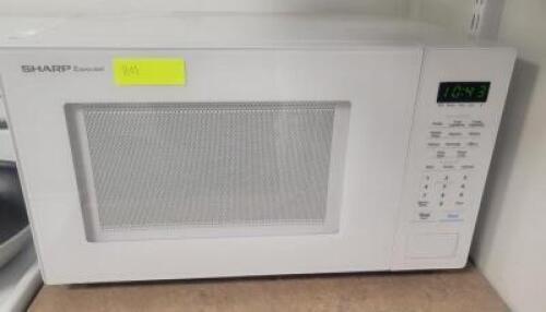 DESCRIPTION: 1000W HOUSEHOLD MICROWAVE OVEN BRAND/MODEL: SHARP SMC1131CW QTY: 1