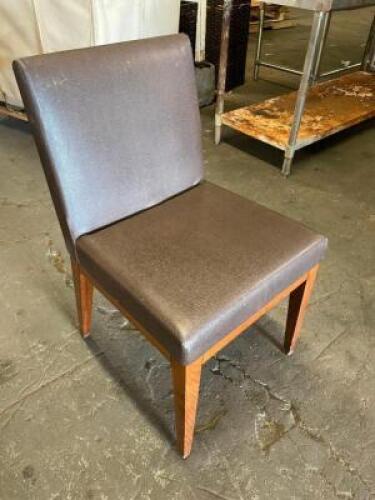 DESCRIPTION: (4) BROWN PLEATHER CHAIRS W/ WOODEN FRAMES. ADDITIONAL INFORMATION: HEAVY DUTY THIS LOT IS: SOLD BY THE PIECE QTY: 4