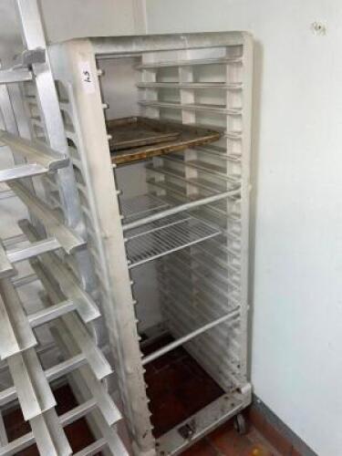 DESCRIPTION: TWENTY PAN ROLL ABOUT PLASTIC TRAY RACK. LOCATION: KITCHEN QTY: 1