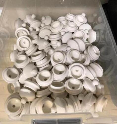 BIN OF SMALL WHITE CHINA LIDS
