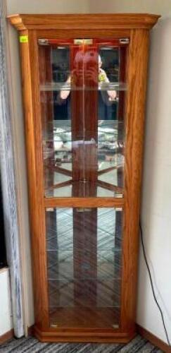 WOODEN CORNER CABINET WITH GLASS SHELVES AND LIGHT