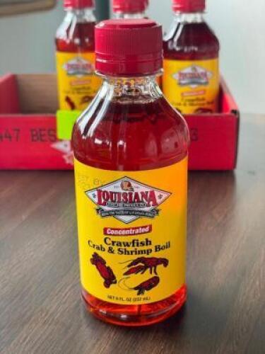 DESCRIPTION: (6) - 8 OZ. BOTTLES OF CRAWFISH BOIL LOCATION: FRONT QTY: 6