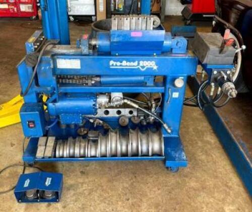 DESCRIPTION: AUTOMATIC HYDRAULIC EXHUAST TUBING BENDER MACHINE BRAND/MODEL: PRO-BEND 2000 INFORMATION: COMES WITH PARTS AND ACCESSORIES AS SHOWN 208-2