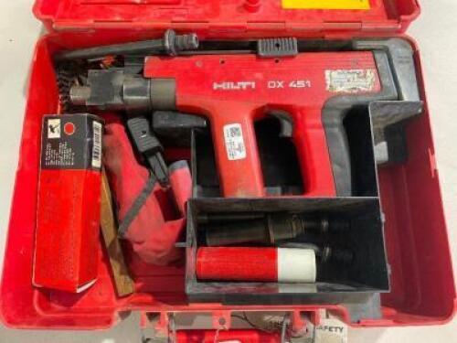 DESCRIPTION: HILTI DX 451 HEAVY DUTY SEMI AUTOMATIC POWDER ACTUATED TOOL. BRAND / MODEL: HILTI DX 451 ADDITIONAL INFORMATION: W/ CASE. LOCATION SHOP Q
