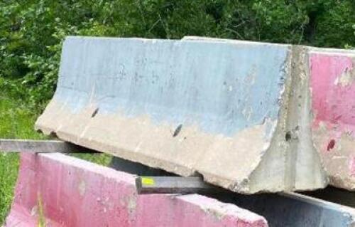 DESCRIPTION: (15) 10' CEMENT JERSEY BARRIER SIZE: 10' X 32" LOCATION: SPACE CENTER LOT QTY: 15