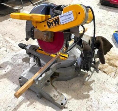 DESCRIPTION: 12" DOUBLE-BEVEL COMPOUND MITER SAW (BROKEN, SEE PHOTOS) BRAND/MODEL: DEWALT DW716 LOCATION: WAREHOUSE QTY: 1