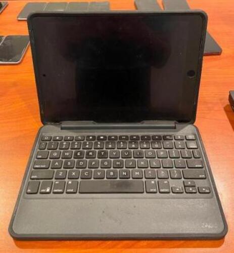 DESCRIPTION: IPAD WITH KEYBOARD CASE INFORMATION: NO PASS CODE OR ICLOUD PASSWORD QTY: 1