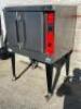 DESCRIPTION: VULCAN SINGLE DECK GAS CONVECTION OVEN BRAND / MODEL: VULCAN ADDITIONAL INFORMATION NATURAL GAS, IN CLEAN CONDITION, ON CASTERS. LOCATION - 3
