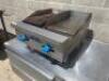 DESCRIPTION: COMSTOCK CASTLE 24" COUNTERTOP GAS GRIDDLE / CHARBROILER. BRAND / MODEL: CASTLE FHP24-12-1RB ADDITIONAL INFORMATION SN# 11P620, NATURAL G - 2