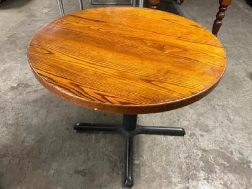 DESCRIPTION: 36" ROUND HARDWOOD TABLE W/ BASE. ADDITIONAL INFORMATION TAKEN APART SIZE 36" R LOCATION: BAY 6 QTY: 1