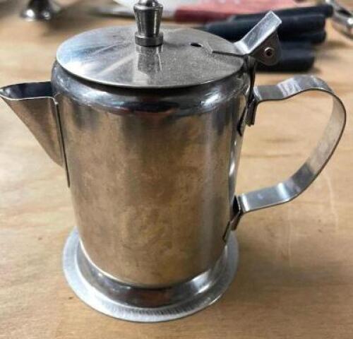DESCRIPTION: (8) STAINLESS CREAM DECANTERS LOCATION: BAY 6 THIS LOT IS: SOLD BY THE PIECE QTY: 8