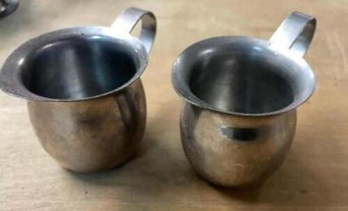 DESCRIPTION: (10) SMALL STAINLESS CREAMERS LOCATION: BAY 6 THIS LOT IS: SOLD BY THE PIECE QTY: 10