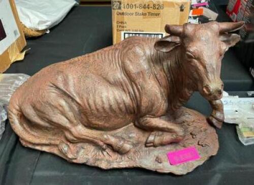 DESCRIPTION: RESTING BULL STATUE SIZE: APPROX. 24" LOCATION: SHOWROOM 1 QTY: 1