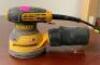 DESCRIPTION: ELECTRIC RANDOM ORBIT PALM SANDER BRAND/MODEL: DEWALT DWE6423 LOCATION: SHOWROOM 2 QTY: 1