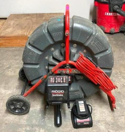 DESCRIPTION: RIDGID SEE SNAKE SC6 DIGITAL RECORDINNG MONITOR W/ RIDGID PORTABLE CAMERA REEL AS SHOWN RETAIL$: INCLUDES BATTERY AND CHARGER AS SHOWN LO