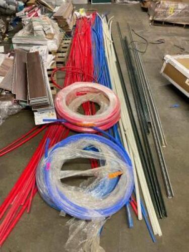 DESCRIPTION: (1) LOT OF ASSORTED RED AND BLUE PLASTIC PIPING. LOCATION: WAREHOUSE THIS LOT IS: ONE MONEY QTY: 1