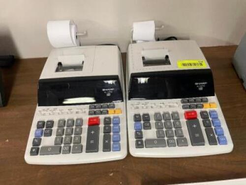 DESCRIPTION: (2) SHARP ADDING MACHINES BRAND / MODEL: SHARP LOCATION: SHR2 THIS LOT IS: ONE MONEY QTY: 1