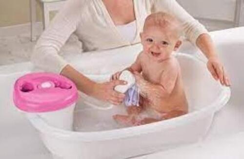 DESCRIPTION: (1) BATH CENTER AND SHOWER BRAND/MODEL: NEWBORN TO TODDLER RETAIL$: $32.00 EA QTY: 1