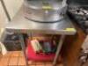 DESCRIPTION: 24" X 24" STAINLESS TABLE ADDITIONAL INFORMATION CONTENTS ARE NOT INCLUDED SIZE 24" X 24" LOCATION: KITCHEN QTY: 1 - 2