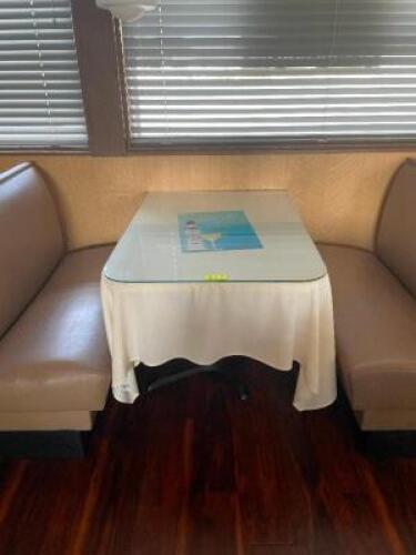 NAME: 41.5" DINING TABLE WITH GLASS PANEL TOP DESCRIPTION: 41.5" DINING TABLE WITH GLASS PANEL TOP ADDITIONAL INFORMATION: TABLE CLOTH NOT INCLUDED. C