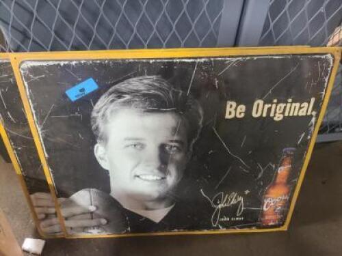 DESCRIPTION: (2)&nbsp;"BE ORIGINAL" TIN COORS LIGHT SIGNSIZE: APPROX 27" X 22 1/4"INFORMATION: (1) JOHN ELWAY, (1) JOE MONTANAQTY: 2