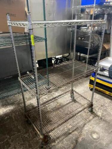 DESCRIPTION: 36" X 18" THREE TIER WIRE SHELF - ON CASTERS SIZE 36" X 18" X 60" LOCATION: AREA #3 QTY: 1