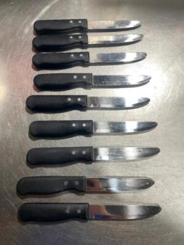 DESCRIPTION: (9) STEAK KNIVES W/ BLACK PLASTIC HANDLES LOCATION: AREA #2 THIS LOT IS: SOLD BY THE PIECE QTY: 9
