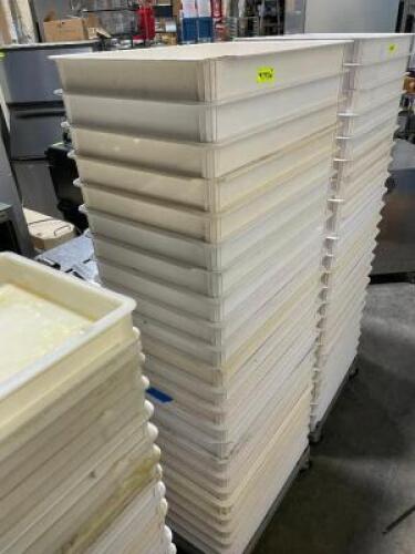 DESCRIPTION: (18) STACKABLE PLASTIC DOUGH BOXES W/ DOLLY LOCATION: AREA #2 THIS LOT IS: SOLD BY THE PIECE QTY: 18