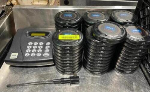 DESCRIPTION: HME SIMPLE INNOVATION RESTAURANT PAGER SYSTEM W/ 60 PAGERS, CHARGING BASES, AND MAIN UNIT BRAND / MODEL: HME LOCATION: AREA #4 QTY: 1
