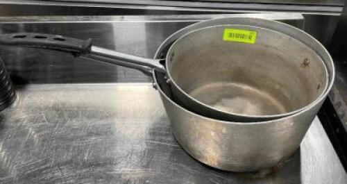 DESCRIPTION: 12" AND 10" ALUMINUM SAUCE POTS LOCATION: AREA #4 THIS LOT IS: SOLD BY THE PIECE QTY: 2