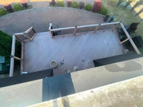 30' X 12.5' COMPOSITE WOOD DECK W/ METAL RAILING POSTS, LIGHTED BANISTERS, AND WIDE STAIRS