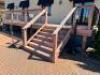 30' X 12.5' COMPOSITE WOOD DECK W/ METAL RAILING POSTS, LIGHTED BANISTERS, AND WIDE STAIRS - 4