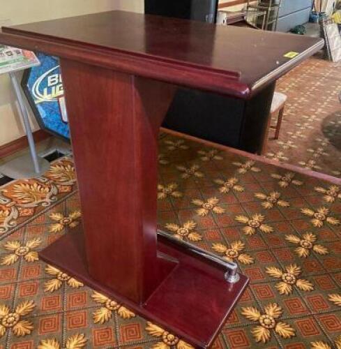 37.5" X 28.5" HARDWOOD PODIUM W/ CHROME FOOT RAIL.